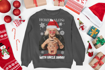 Christmas jumper featuring a quirky design inspired by the movie Home Alone. The front of the sweater shows a playful mashup with Uncle Jimmy Saville's face alongside iconic scenes from the film. The vibrant colors and festive elements, like Christmas trees and snowflakes, add to the holiday theme. The design combines elements of both nostalgia and humor, blending classic holiday imagery with a pop-culture twist