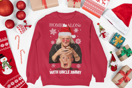 Christmas jumper featuring a quirky design inspired by the movie Home Alone. The front of the sweater shows a playful mashup with Uncle Jimmy Saville's face alongside iconic scenes from the film. The vibrant colors and festive elements, like Christmas trees and snowflakes, add to the holiday theme. The design combines elements of both nostalgia and humor, blending classic holiday imagery with a pop-culture twist