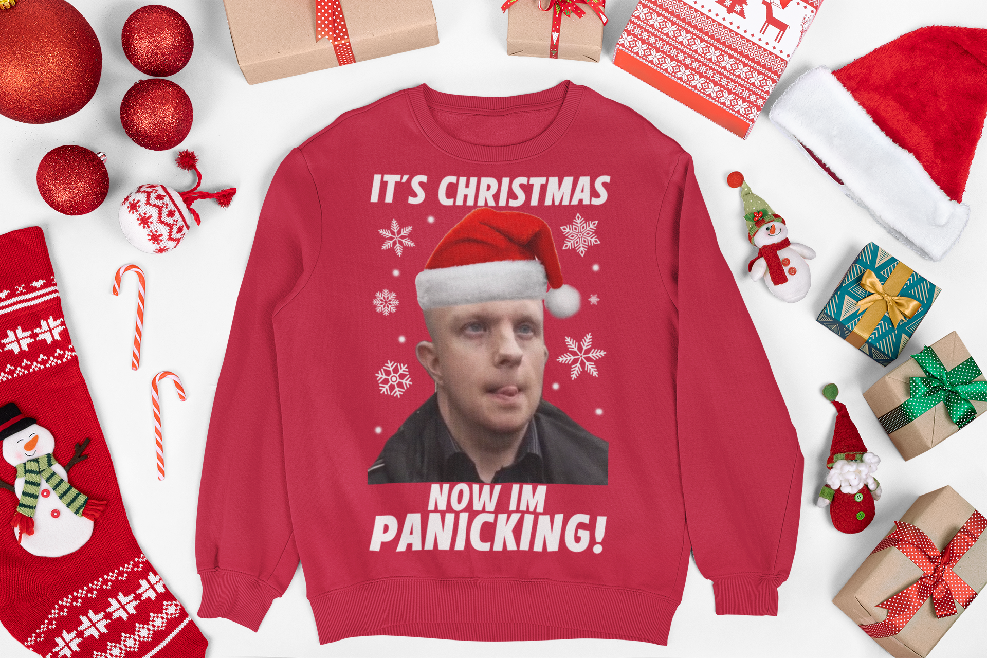 Christmas jumper featuring a bald nonce, humorous design with a cartoon character or face, adding a cheeky twist to your holiday wardrobe. The sweater has a playful vibe, with festive elements like Christmas trees or snowflakes incorporated into the design
