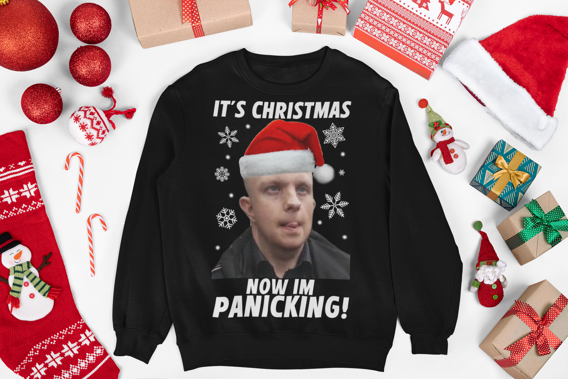 Christmas jumper featuring a bald nonce, humorous design with a cartoon character or face, adding a cheeky twist to your holiday wardrobe. The sweater has a playful vibe, with festive elements like Christmas trees or snowflakes incorporated into the design