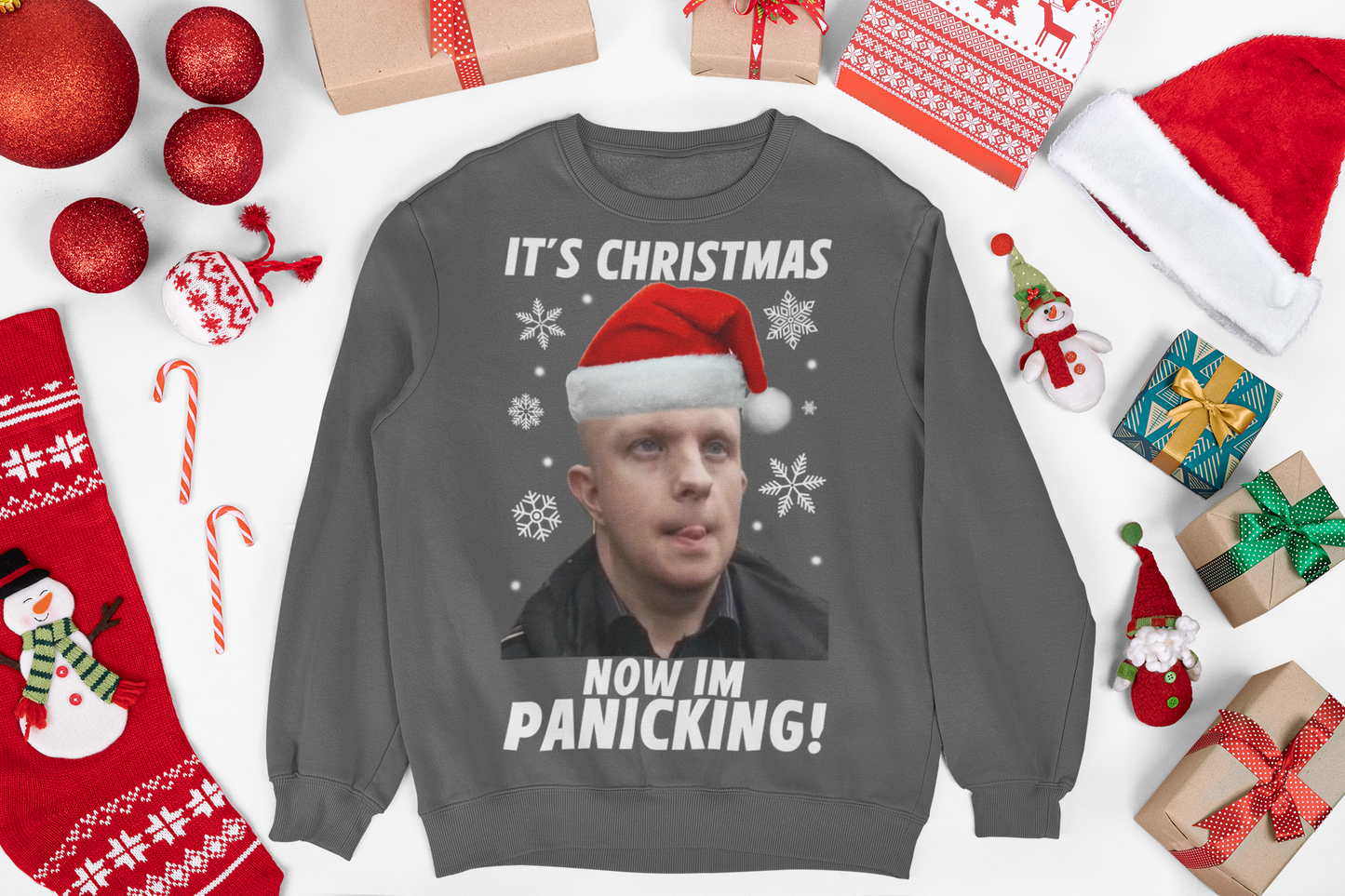 Christmas jumper featuring a bald nonce, humorous design with a cartoon character or face, adding a cheeky twist to your holiday wardrobe. The sweater has a playful vibe, with festive elements like Christmas trees or snowflakes incorporated into the design