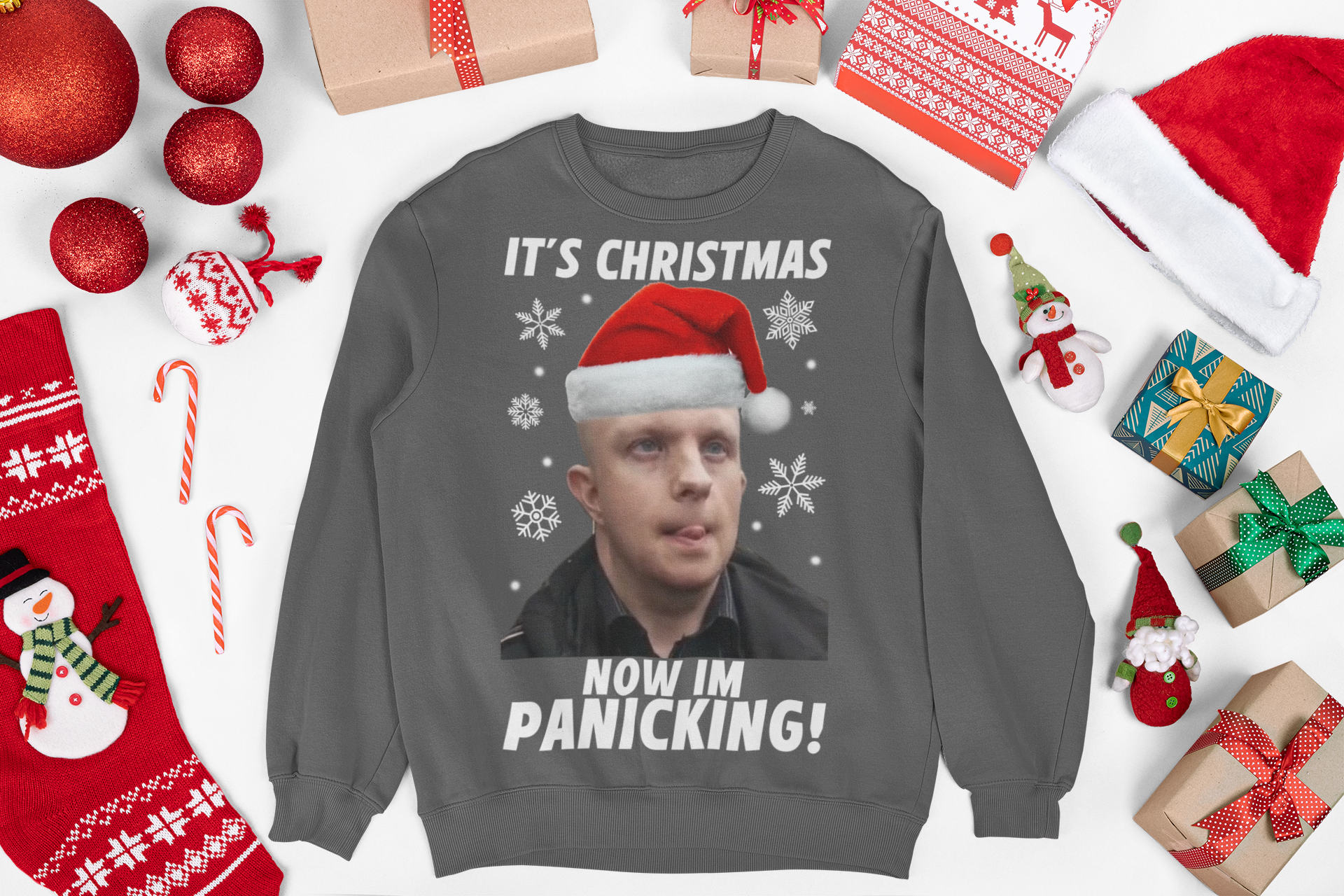 Christmas jumper featuring a bald nonce, humorous design with a cartoon character or face, adding a cheeky twist to your holiday wardrobe. The sweater has a playful vibe, with festive elements like Christmas trees or snowflakes incorporated into the design